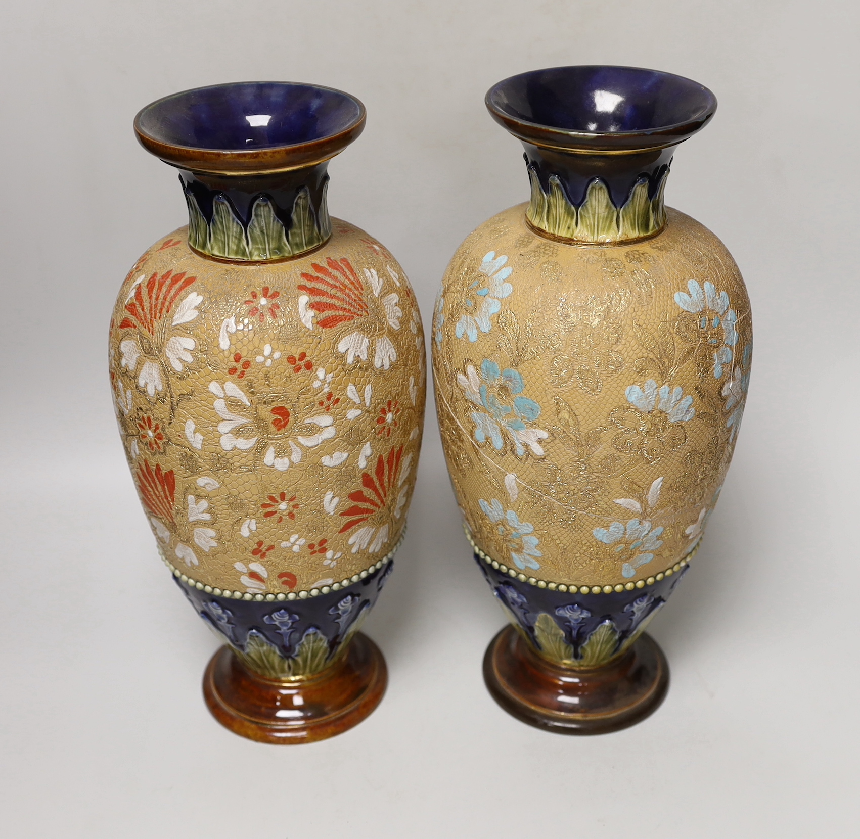 A pair of Doulton Lambeth Stoneware vases